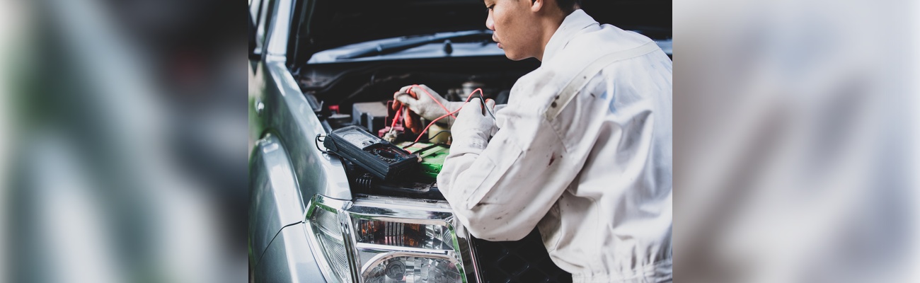 car-repairman-wearing-white-uniform-standing-holding-wrench-that-is-essential-tool-mechanic