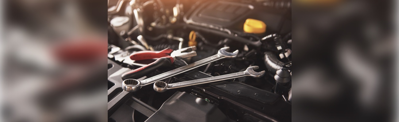 mechanic-hand-checking-fixing-broken-car-car-service-garage